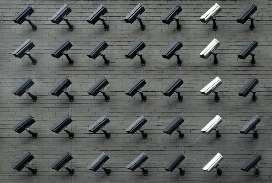 Rows of security cameras on a grey wall