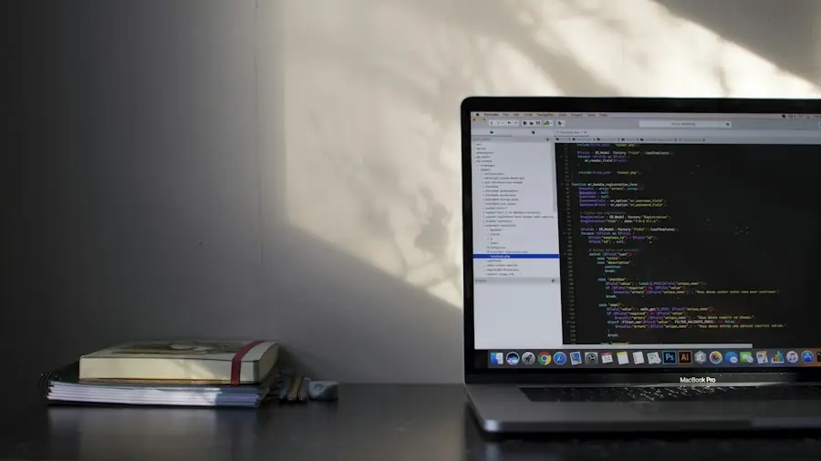 Laptop showing code on a desk