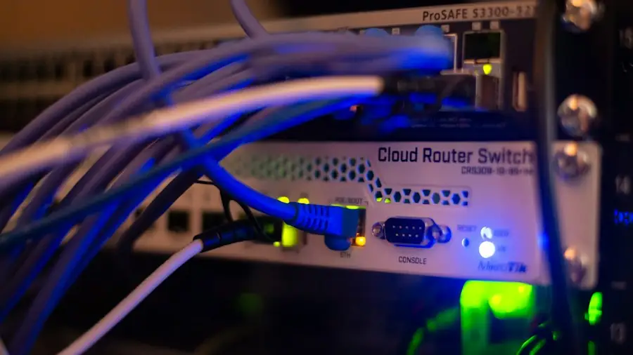 Network switch with blue cables and status lights
