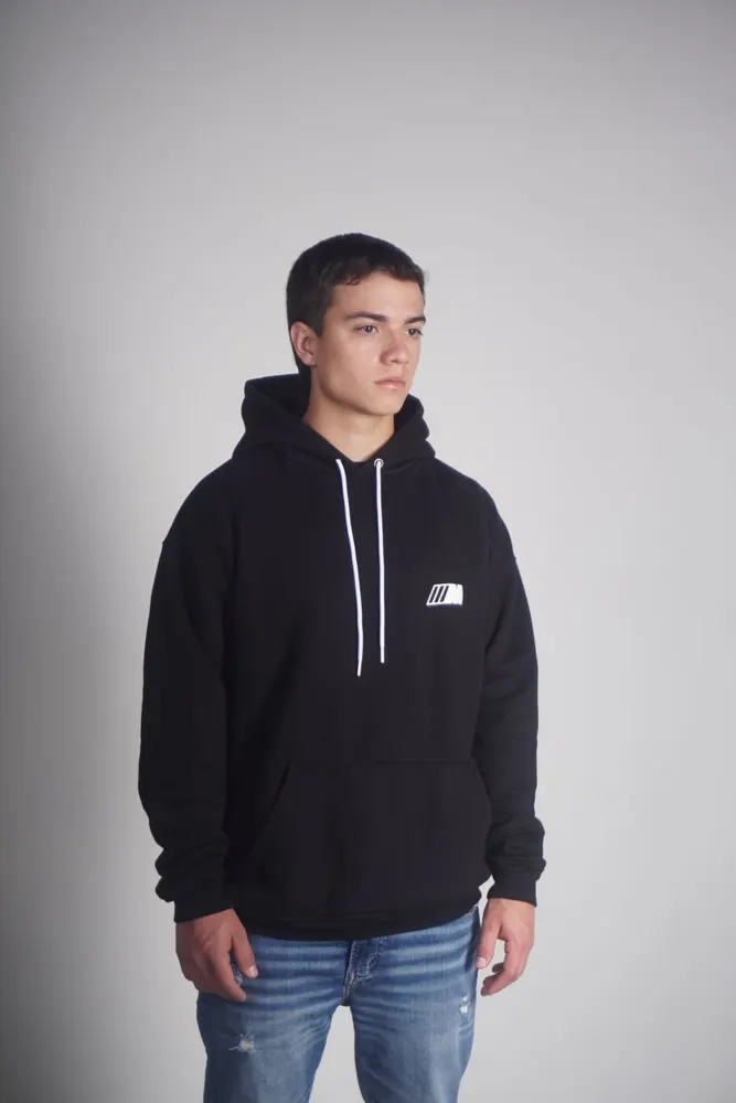 Man wearing a plain black hoodie