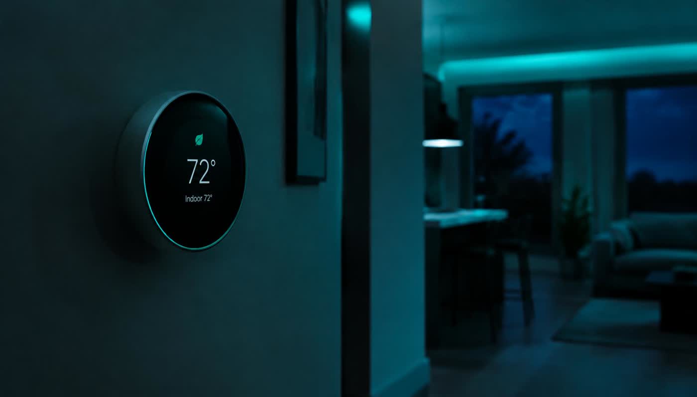 Smart thermostat mounted on a wall in a modern home